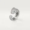 Anello Panthere De Cartier – Oro bianco, diamanti, smeraldi, onice – Cartier