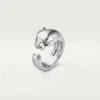 Anello Panthere De Cartier – Oro bianco, granati tsavoriti, onice – Cartier