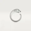 Anello Panthere De Cartier – Oro bianco, granati tsavoriti, onice – Cartier