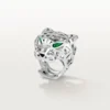 Anello Panthere De Cartier – Oro bianco non rodiato, granati tsavoriti, onice – Cartier