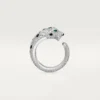 Anello Panthere De Cartier – Oro bianco, smeraldi, onice, diamanti – Cartier