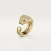 Anello Panthere De Cartier – Oro giallo, diamanti, smeraldi, onice – Cartier