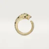 Anello Panthere De Cartier – Oro giallo, smeraldi, onice, diamanti – Cartier