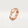 Anello Panthere De Cartier – Oro rosa, granati tsavoriti, onice – Cartier