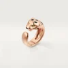 Anello Panthere De Cartier – Oro rosa, granati tsavoriti, onice – Cartier
