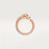 Anello Panthere De Cartier – Oro rosa, granati tsavoriti, onice – Cartier