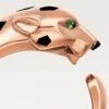 Anello Panthere De Cartier – Oro rosa, granati tsavoriti, onice – Cartier
