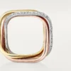 Anello Trinity, forma a cuscino, modello medio, mezzo pavé