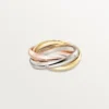 Anello Trinity, modello classico, 5 diamanti