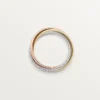 Anello Trinity, modello piccolo, semi-pavé