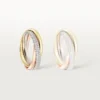 Anello Trinity, modello piccolo, semi-pavé