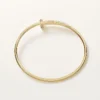 Bracciale Juste Un Clou, modello piccolo, diamanti incastonati a rovescio