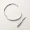 Bracciale Love, modello medio, 4 diamanti