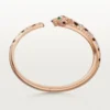 Bracciale Panthere De Cartier, modello medio, semi-pavé