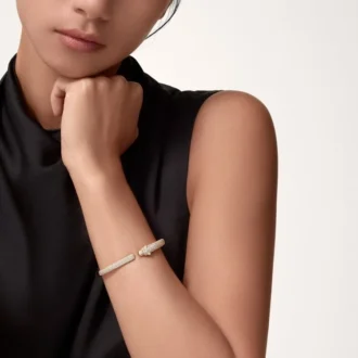 Bracciale Panthere De Cartier, modello piccolo, semi-pavé