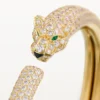 Bracciale Panthere De Cartier, modello piccolo, semi-pavé