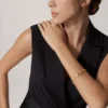 Bracciale Panthere De Cartier – Oro giallo, lacca, diamanti, granati tsavoriti, onice – Cartier