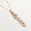 Collana Agrafe – Oro rosa, diamanti – Cartier