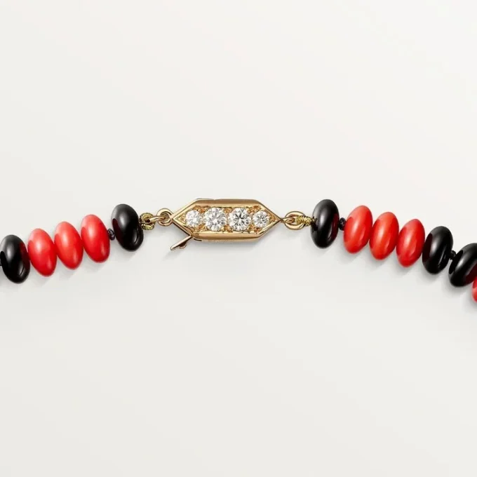 Collana di alta gioielleria – Oro rosa, corallo, onice, lacca nera, diamanti – Cartier