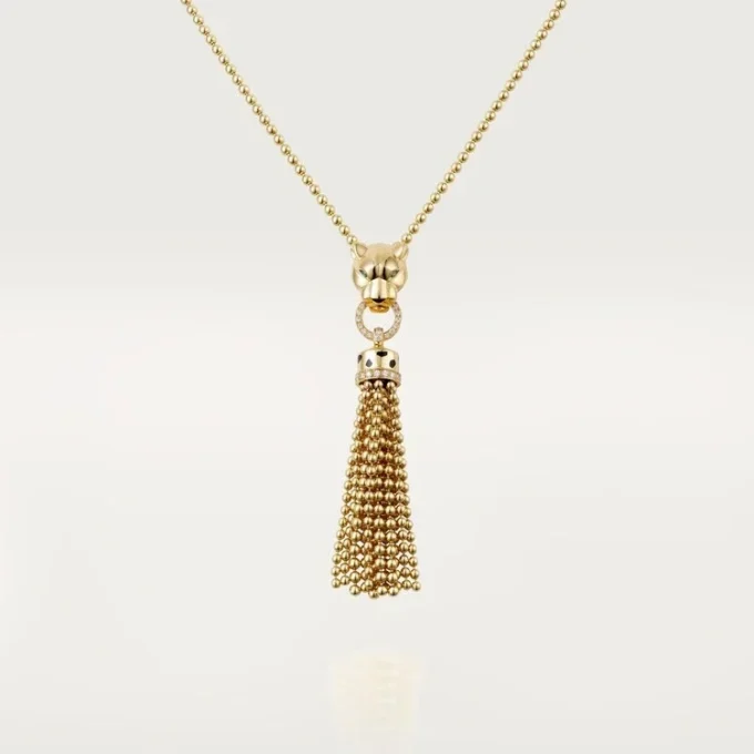 Collana Panthere De Cartier – Oro giallo, lacca nera, granati tsavoriti, onice, diamanti – Cartier