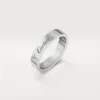 Fede nuziale C De Cartier – Platino, diamanti – Cartier
