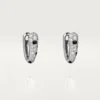 Orecchini a cerchio piccoli Panthere Diamond, oro bianco | Cartier Us