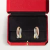 Orecchini a cerchio Trinity in oro tricolore | Cartier Us