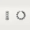 Orecchini Clash De Cartier, modello Mini