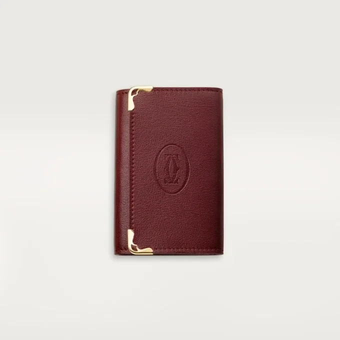 Portachiavi a 6 anelli, Must De Cartier – Pelle di vitello bordeaux, finitura dorata – Cartier