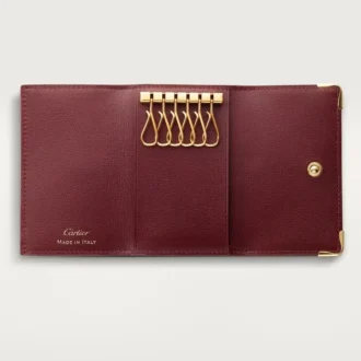 Portachiavi a 6 anelli, Must De Cartier – Pelle di vitello bordeaux, finitura dorata – Cartier