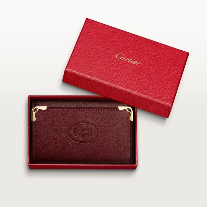 Portachiavi a 6 anelli, Must De Cartier – Pelle di vitello bordeaux, finitura dorata – Cartier