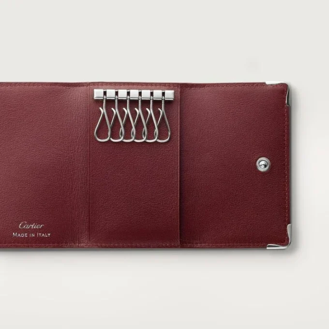 Portachiavi a 6 anelli, Must de Cartier – Pelle di vitello nera, finitura in acciaio inossidabile – Cartier
