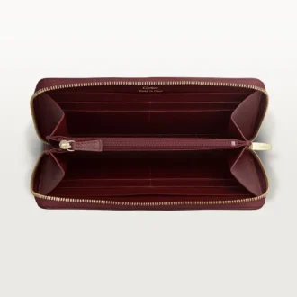 Portafoglio internazionale con cerniera, Must De Cartier – Pelle di vitello bordeaux, finitura dorata – Cartier