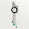 Spilla Panthere De Cartier – Oro bianco, smeraldi, onice, diamanti – Cartier